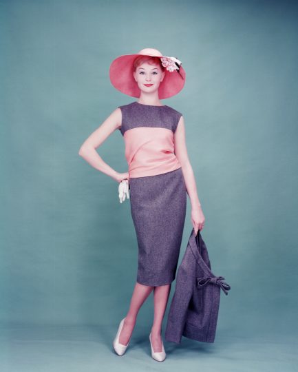 1959:  A woman modelling a day dress and sunhat as part of the new Dior collection.  (Photo by Keystone/Getty Images)